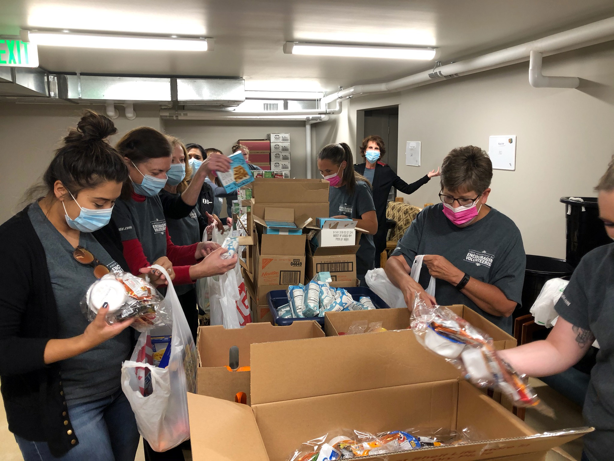 First Interstate Bank employees pack weekend meals